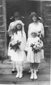 Annie Dakin as a bridesmaid (far left)